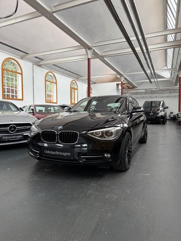 Schwarz Gebraucht 2012 BMW 116 Sport Line Kleinwagen | 9.500 € (Fairer Preis) - Bild 1/4