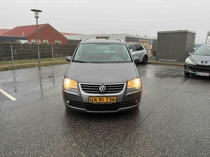 Grau Gebraucht 2007 VW Touran Highline Van / Kleinbus | 850 € (Superpreis) - Bild 1/4