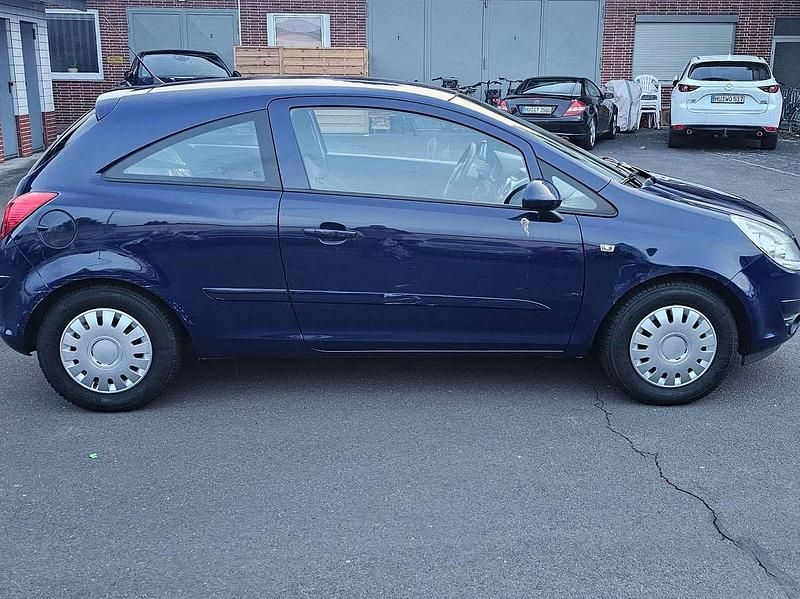 Royalblau h: u2/f:atlantikblau Gebraucht 2007 Opel Corsa Kleinwagen | 3.500 € (Fairer Preis) - Bild 1/4