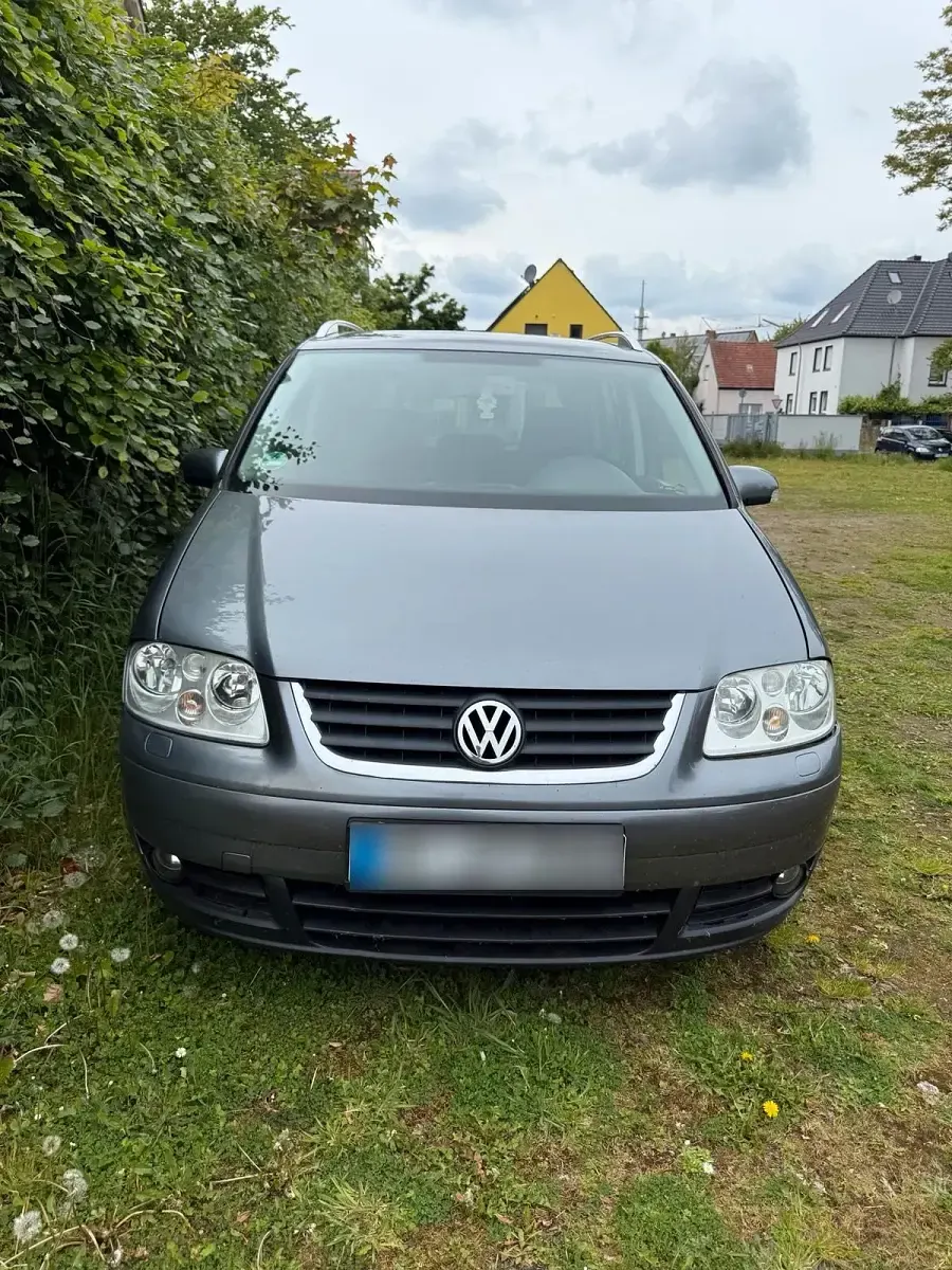 Używany VW Touran 136 KM (100 kW) 2003 Srebrny Minivan