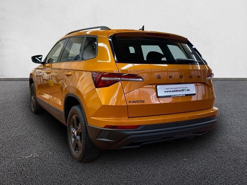 Gebraucht Skoda Karoq Tour 116 PS (85 kW) 2023 Phoenixorange premium metallic SUV