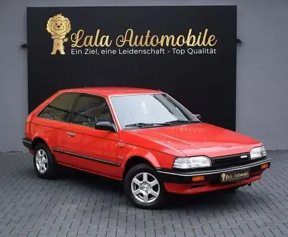 Gebraucht Mazda 323 75 PS (55 kW) 1988 Rot Kleinwagen