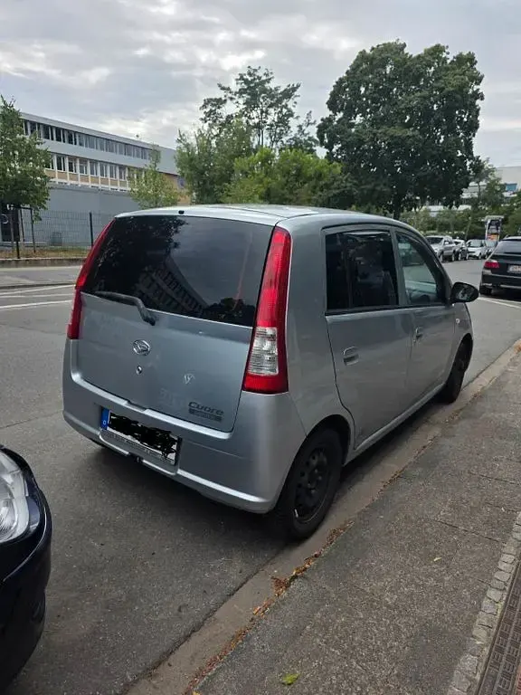 Gebraucht Daihatsu Cuore 58 PS (42 kW) 2006 Silber Kleinwagen