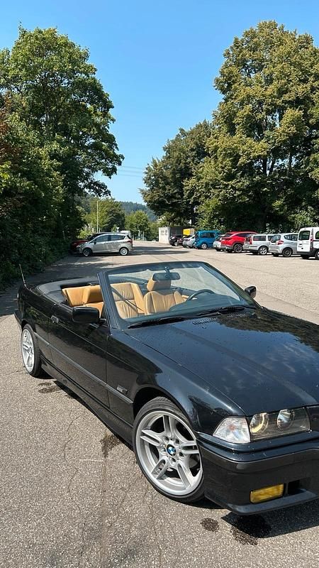 Schwarz Gebraucht 1996 BMW 318 Cabriolet M Sport Cabrio | 5.400 € (Fairer Preis) - Bild 1/4