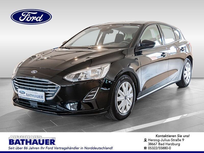 Schwarz metallic Gebraucht 2018 Ford Focus Trend Limousine | 16.990 € - Bild 1/4