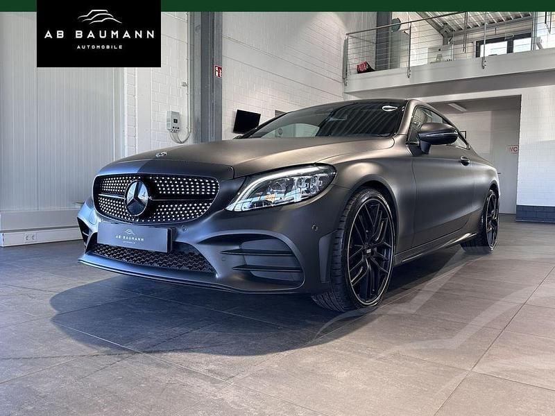 Schwarz ung. schwarz unilack (metallic) Gebraucht 2021 Mercedes C300 AMG Coupé | 36.990 € (Guter Preis) - Bild 1/3