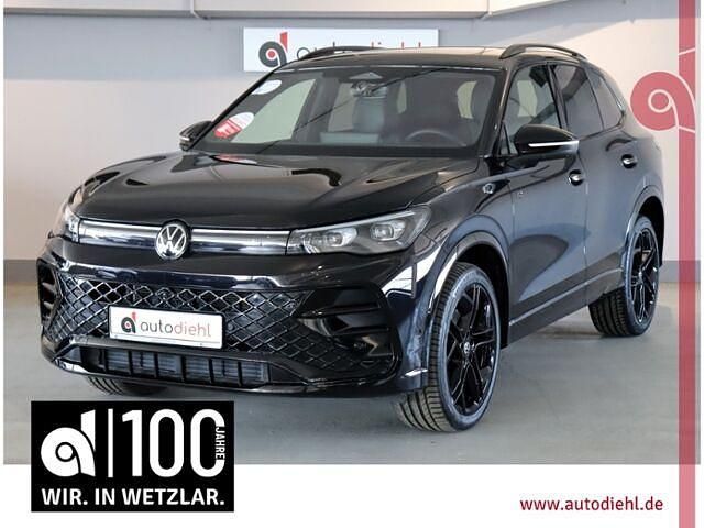 Black metallic Gebraucht 2024 VW Tiguan R-line SUV | 52.490 € - Bild 1/2