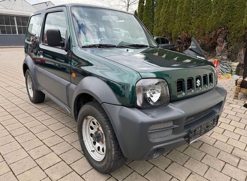 Grün Gebraucht 2008 Suzuki Jimny SUV | 3.999 € - Bild 1/4