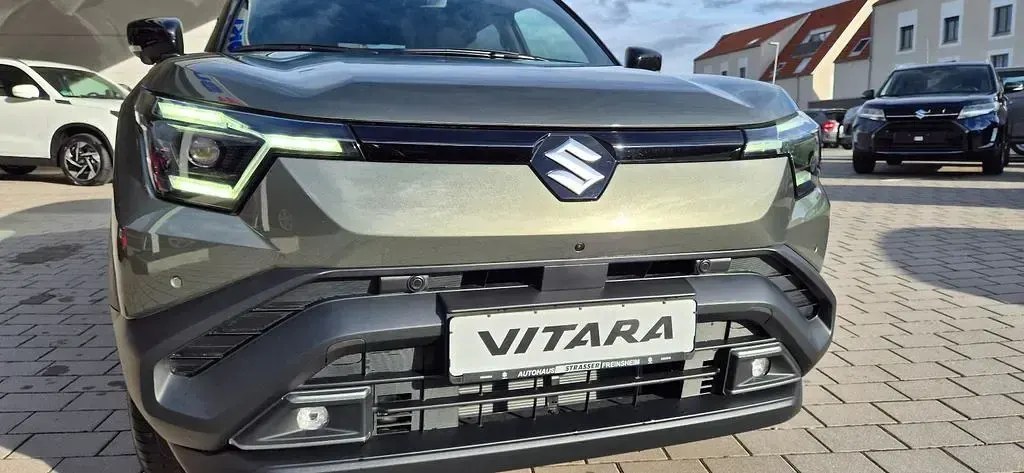 Gebraucht Suzuki e-Vitara Comfort+ 127 kW (174 PS) 2026 Grün SUV
