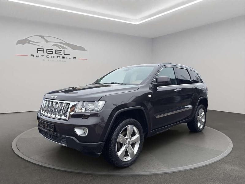 Luxury brown pearl coat Gebraucht 2012 Jeep Grand Cherokee Overland SUV | 8.900 € (Superpreis) - Bild 1/4