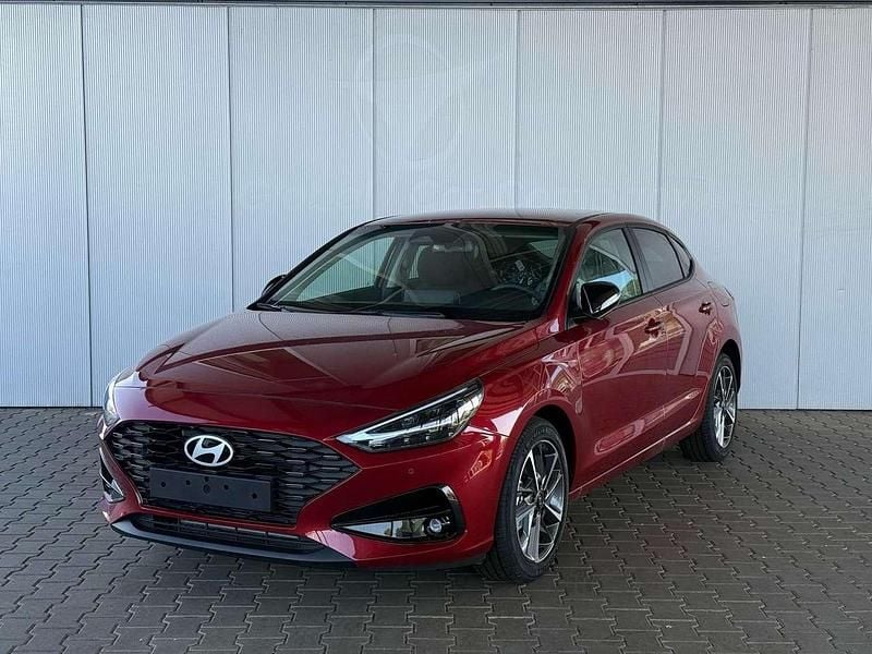 Ultimate red metallic Neu 2025 Hyundai i30 Prime Coupé | 24.750 € (Guter Preis) - Bild 1/4