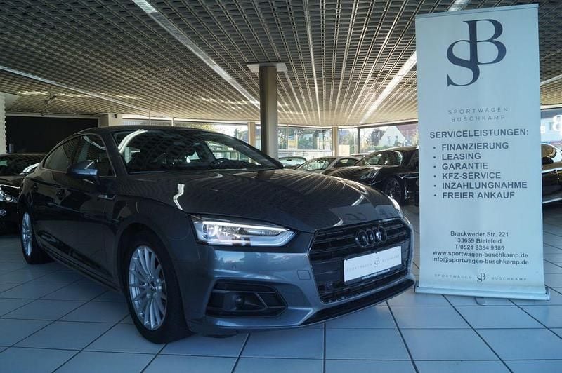 Monsungrau metallic Gebraucht 2018 Audi A5 Coupé | 21.900 € (Fairer Preis) - Bild 1/4