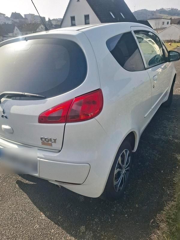 Second-hand Mitsubishi Colt 70 CP (51 kW) 2008 Alb Berlinǎ