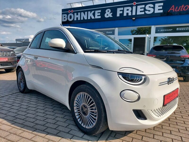 Colore esterno (arktis weiß) Neu 2025 Fiat 500e La Prima Kleinwagen | 23.999 € - Bild 1/4