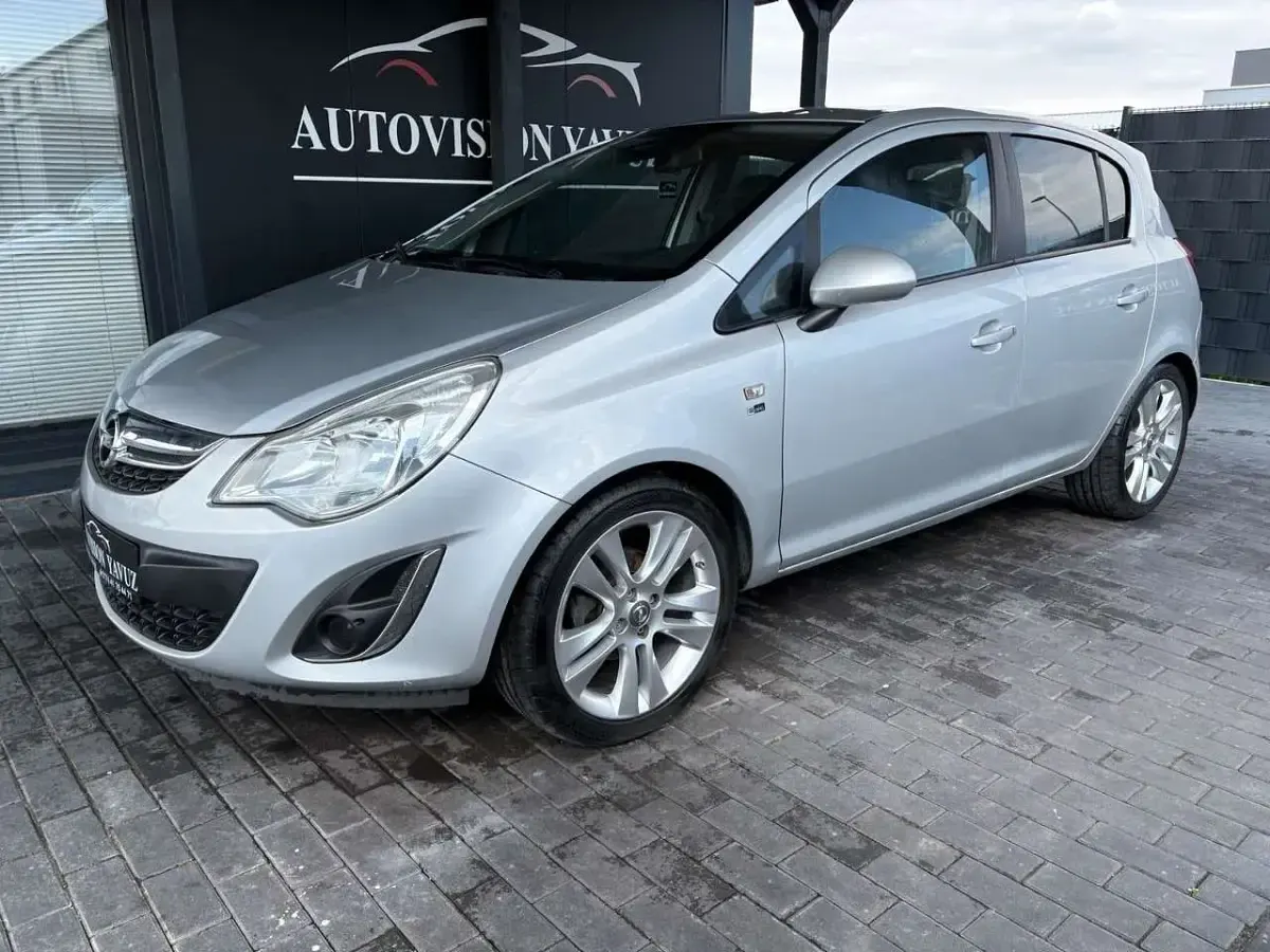 Używany Opel Corsa 87 KM (63 kW) 2012 Srebrny Hatchback