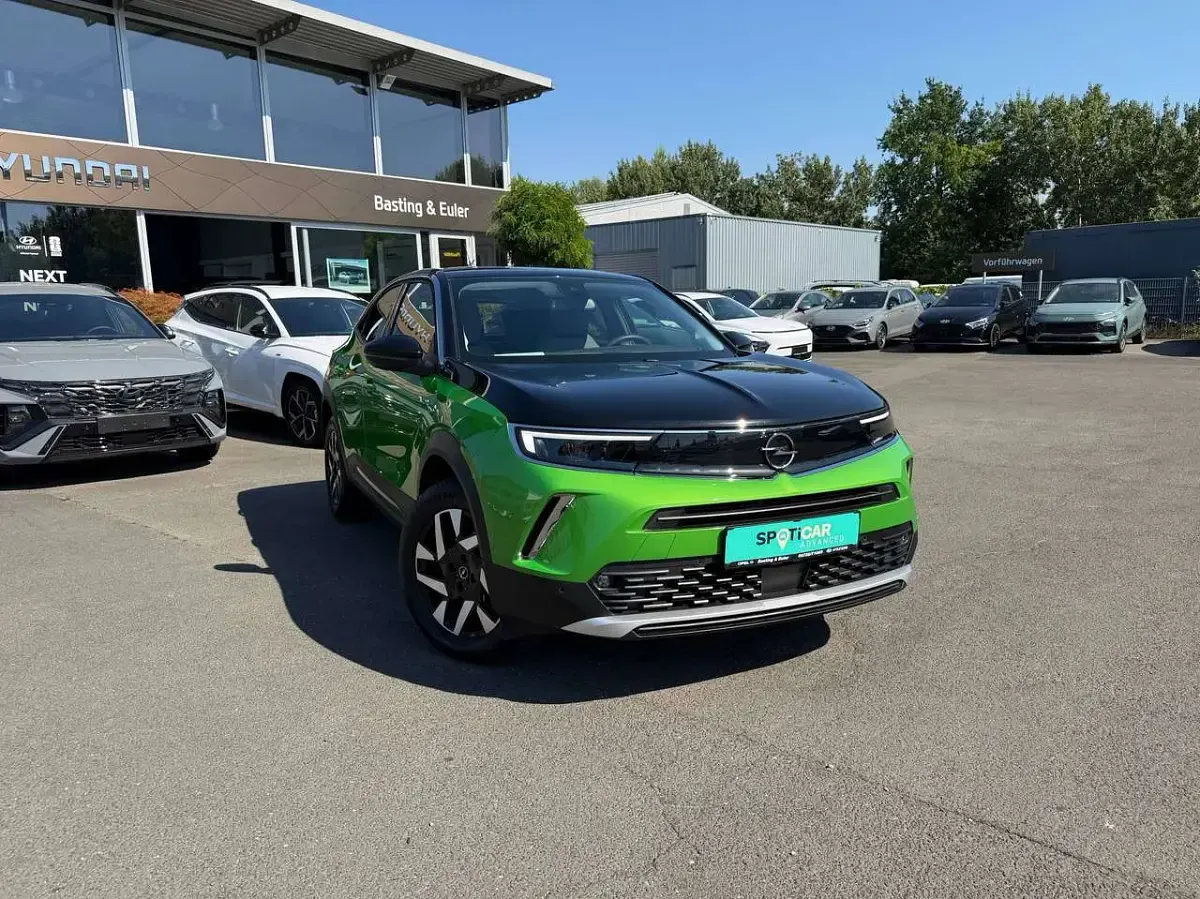 Gebraucht Opel Mokka Elegance 131 PS (96 kW) 2021 Matcha green/ikone gruen SUV