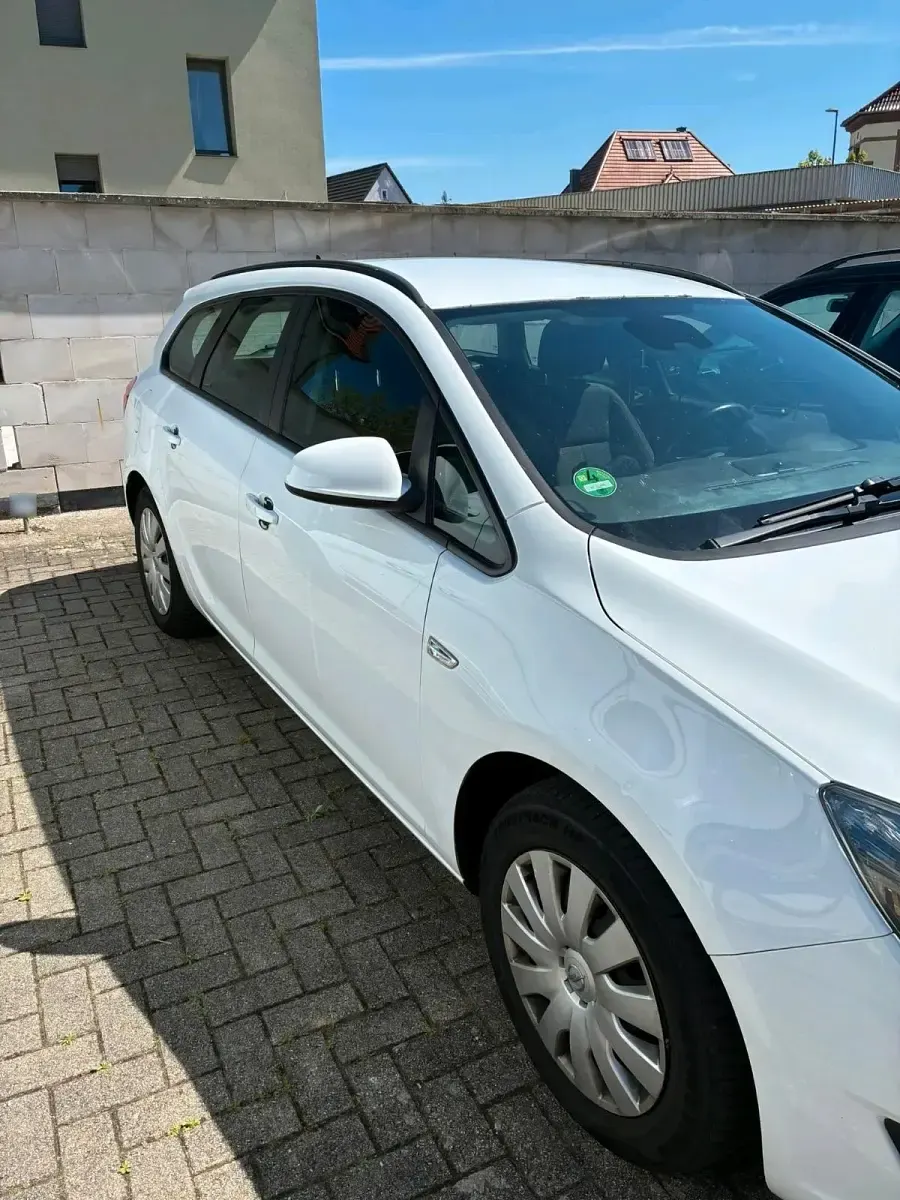 Używany Opel Astra 136 KM (100 kW) 2014 Biały Kombi
