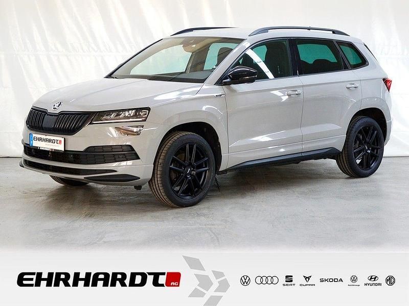 Grau Gebraucht 2020 Skoda Karoq SportLine SUV | 21.689 € (Fairer Preis) - Bild 1/4