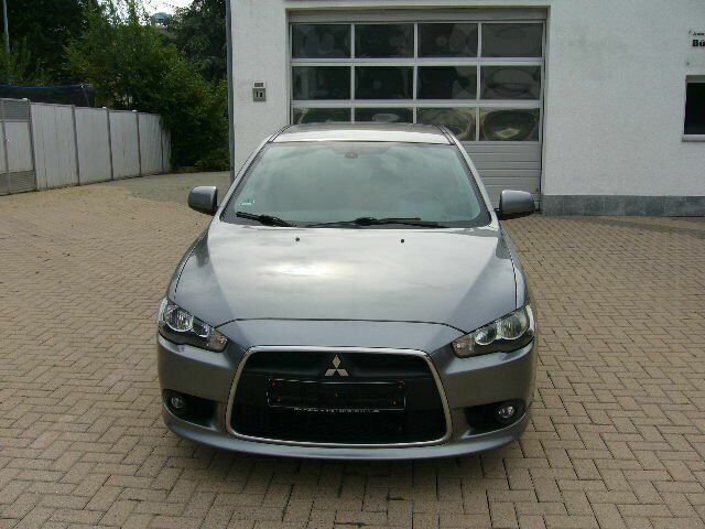 Gebraucht Mitsubishi Lancer 116 PS (85 kW) 2014 Grau metallic Limousine