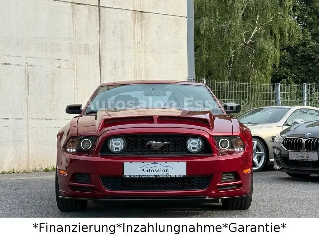 Gebraucht Ford Mustang GT 424 PS (311 kW) 2014 Rapid red / molten magenta Coupé