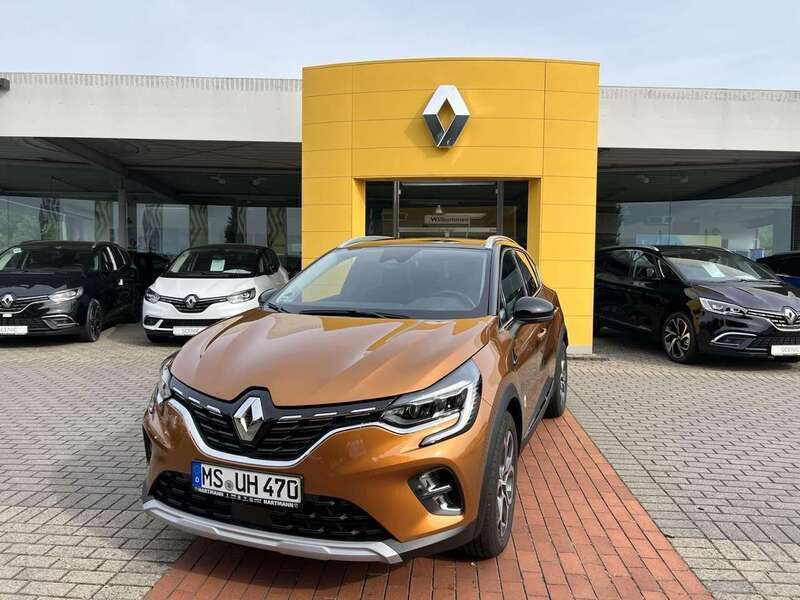 Taklamakanorange metallic, black pearlschwarz me (orange) Gebraucht 2022 Renault Captur Intens SUV | 22.989 € (Etwas zu teuer) - Bild 1/3