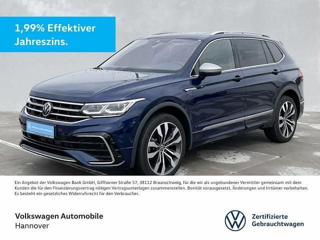 Atlantic blue metallic Gebraucht 2024 VW Tiguan Allspace R-line SUV | 44.280 € (Fairer Preis) - Bild 1/3