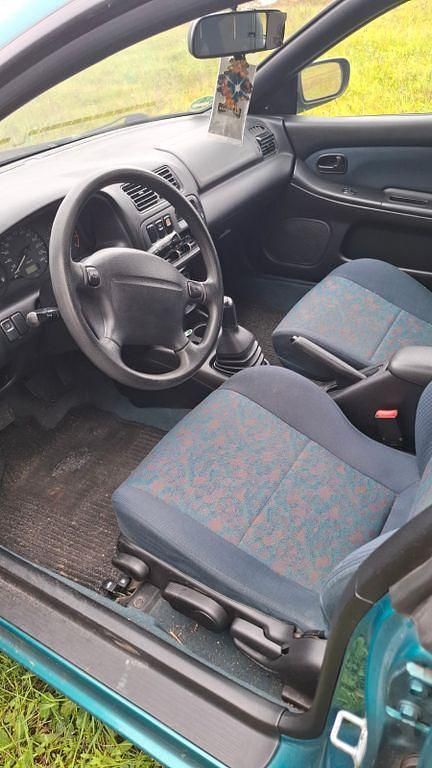 Grün Gebraucht 1997 Mazda 323F Limousine | 2.000 € (Etwas zu teuer) - Bild 1/4