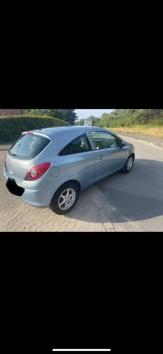 Second-hand Opel Corsa 59 CP (43 kW) 2009 Albastru Hatchback