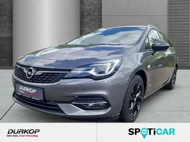 Grau Gebraucht 2021 Opel Astra Design Edition Kombi | 15.990 € (Fairer Preis) - Bild 1/4