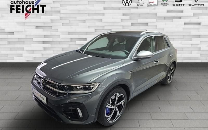 Grau (indiumgrau metallic) Gebraucht 2023 VW T-Roc R SUV | 36.740 € (Fairer Preis) - Bild 1/4