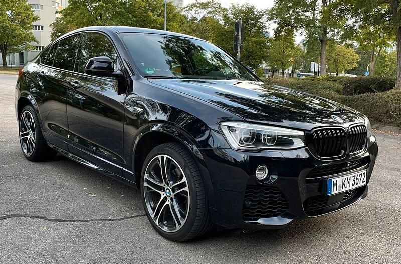 Schwarz Gebraucht 2017 BMW X4 Performance SUV | 29.900 € - Bild 1/4