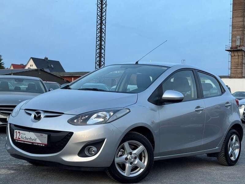 Satinsilber metallic Gebraucht 2012 Mazda 2 Edition Kleinwagen | 4.499 € (Fairer Preis) - Bild 1/4