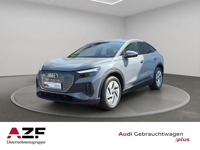 Grau Gebraucht 2022 Audi Q4 e-tron Basis SUV | 26.980 € (Guter Preis) - Bild 1/4