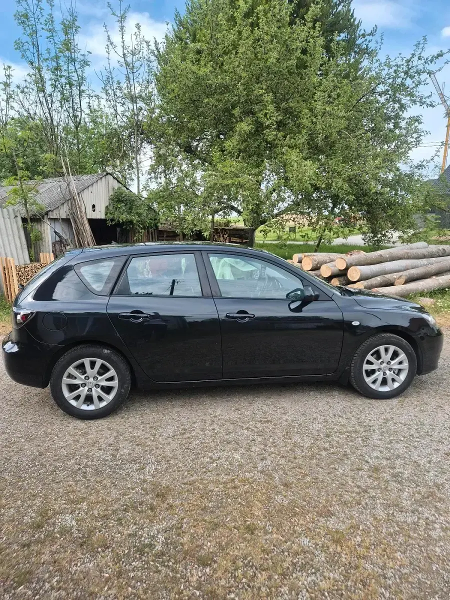 Używany Mazda 3 112 KM (82 kW) 2008 Czarny Hatchback