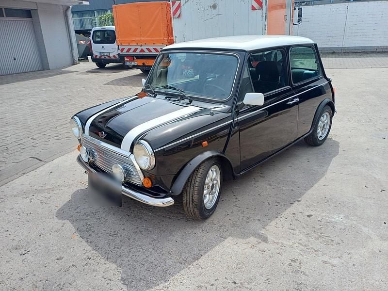 Second-hand Mini 1300 63 CP (46 kW) 1994 Negru Hatchback