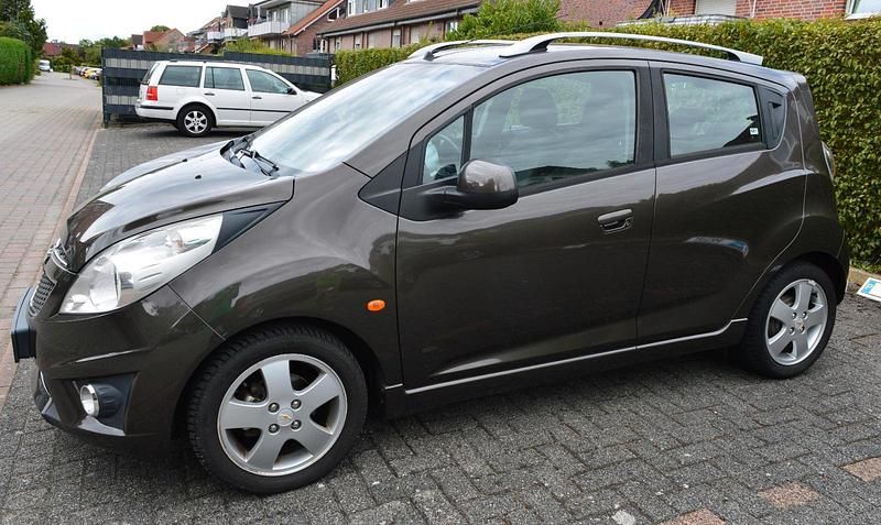 Braun Gebraucht 2010 Chevrolet Spark Kleinwagen | 3.490 € (Teuer) - Bild 1/4