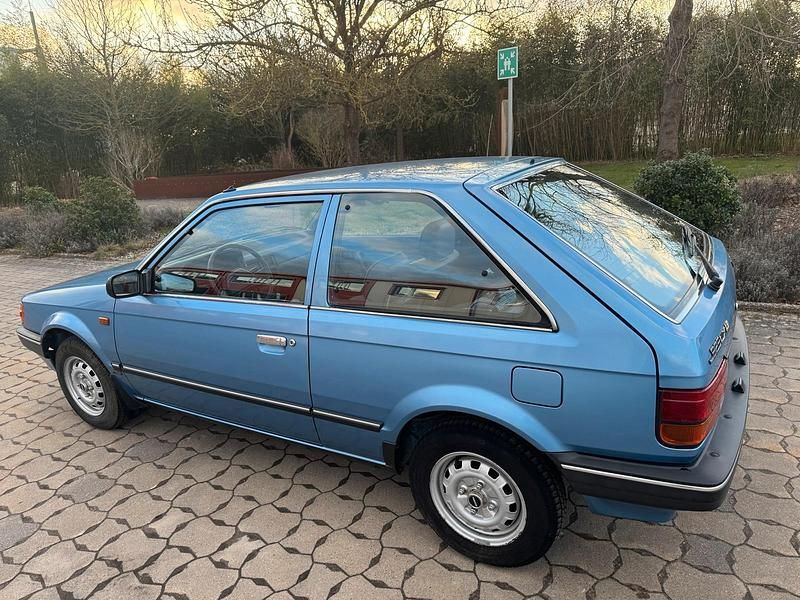 Gebraucht Mazda 323 60 PS (44 kW) 1987 Blau Kleinwagen