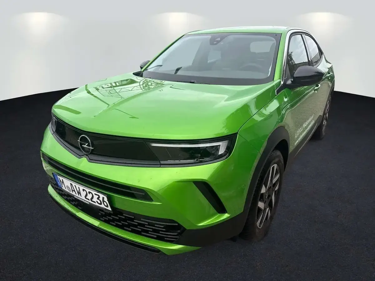 Gebraucht Opel Mokka Elegance 101 PS (74 kW) 2024 Lackierung matcha green/typ au SUV