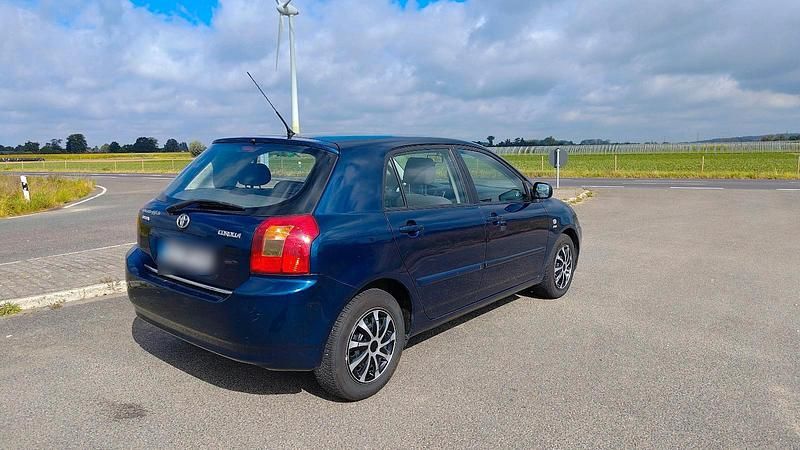 Blau Gebraucht 2004 Toyota Corolla Limousine | 3.600 € (Fairer Preis) - Bild 1/4