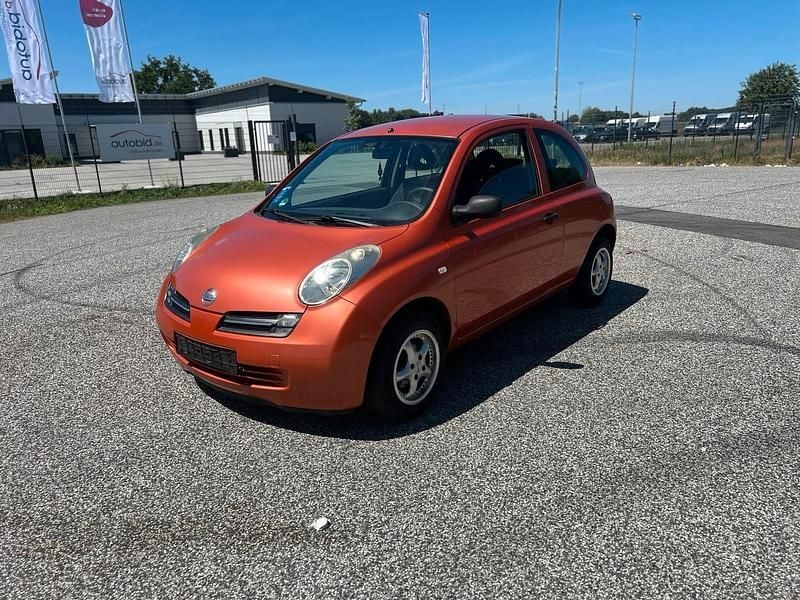 Orange Gebraucht 2004 Nissan Micra Kleinwagen | 1.799 € - Bild 1/4