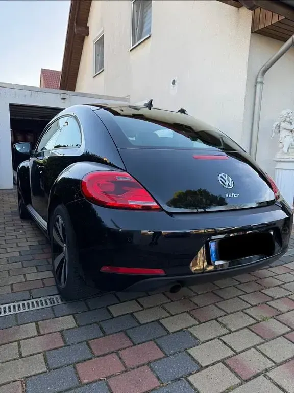 Gebraucht VW Beetle 105 PS (77 kW) 2013 Schwarz Kleinwagen