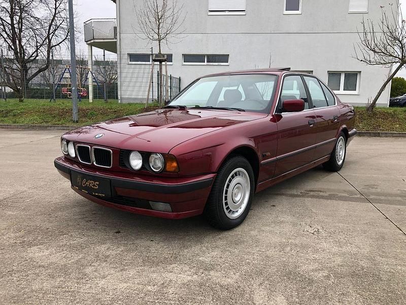 Gebraucht BMW 518 116 PS (85 kW) 1994 Rot Limousine
