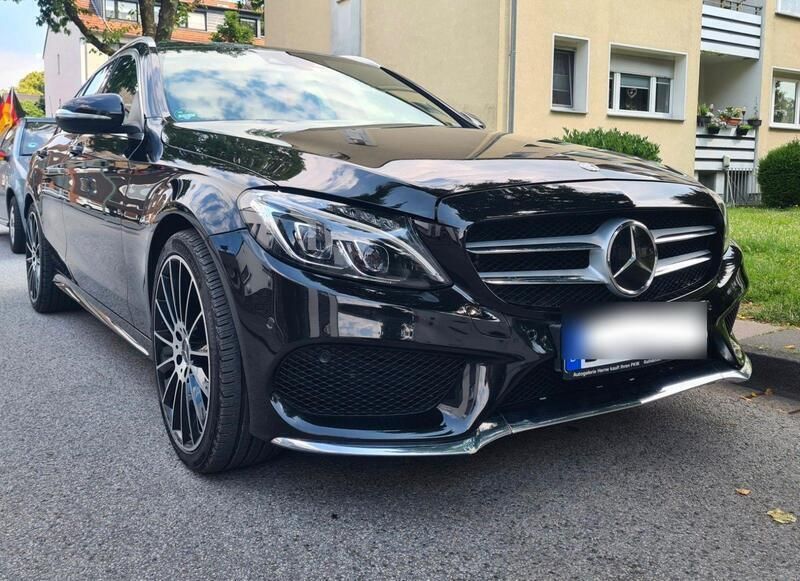 Schwarz Gebraucht 2014 Mercedes C250 AMG line Kombi | 14.350 € (Fairer Preis) - Bild 1/4