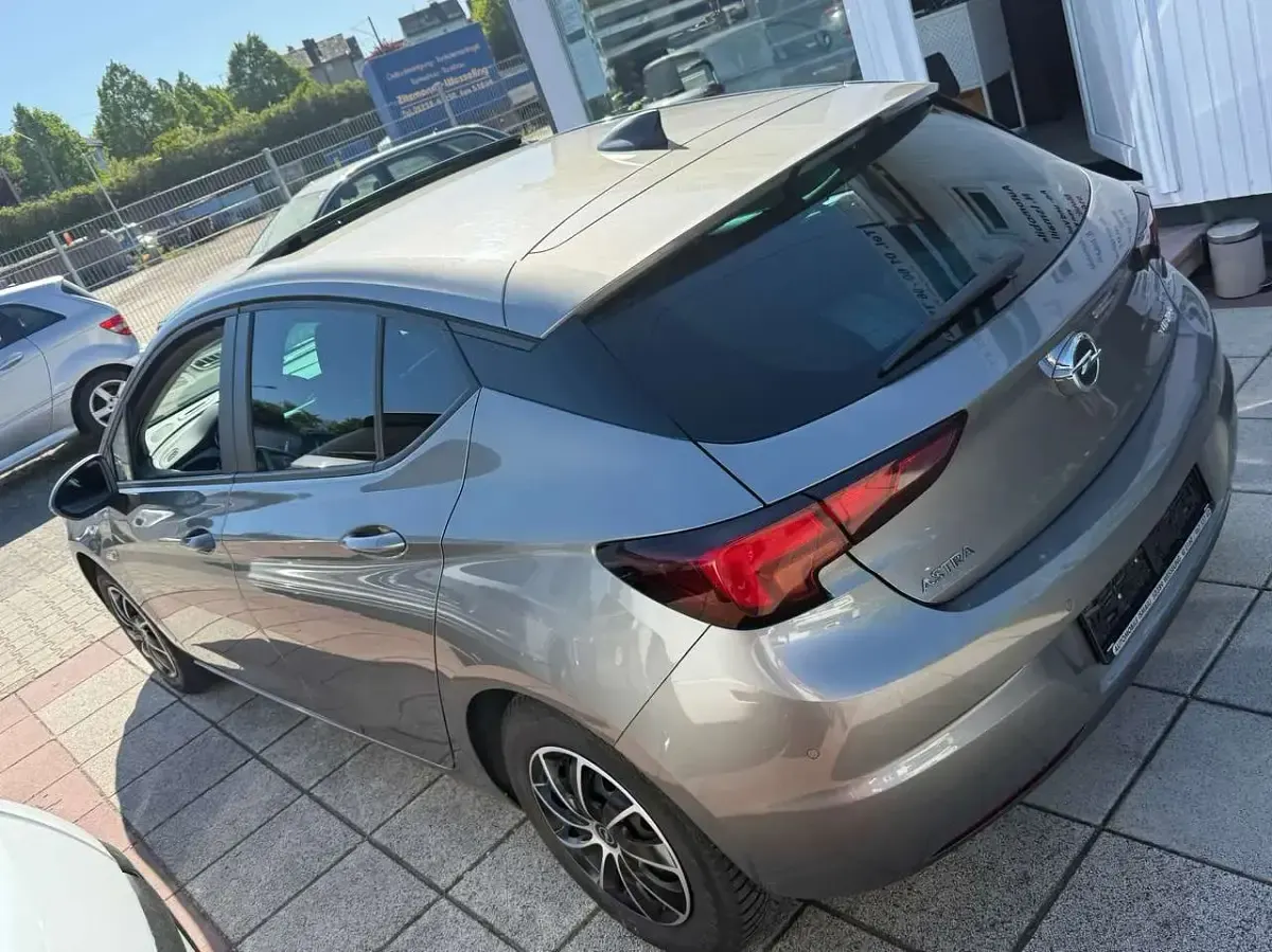 Gebraucht Opel Astra Edition 125 PS (91 kW) 2015 Beige grau (m2) Kleinwagen