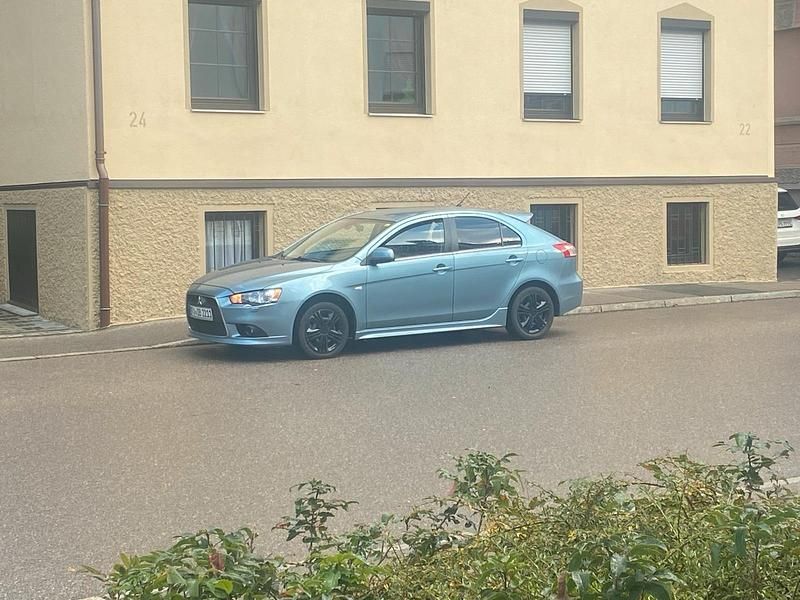 Blau Gebraucht 2009 Mitsubishi Lancer Limousine | 5.500 € (Fairer Preis) - Bild 1/4