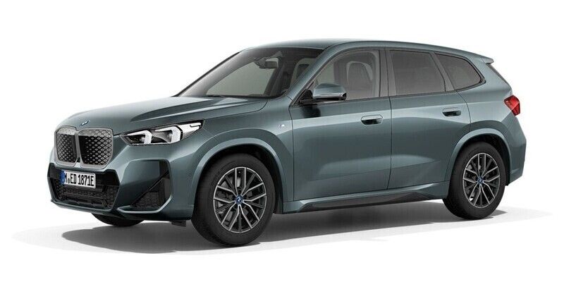 Grün Gebraucht 2024 BMW iX1 Luxury Line SUV | 48.947 € (Teuer) - Bild 1/4