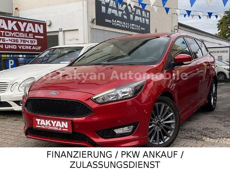 Red candy/candy red Gebraucht 2017 Ford Focus ST-Line Kombi | 10.990 € (Fairer Preis) - Bild 1/4