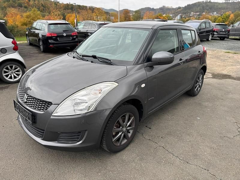 Grau Gebraucht 2012 Suzuki Swift Kleinwagen | 3.999 € (Superpreis) - Bild 1/4