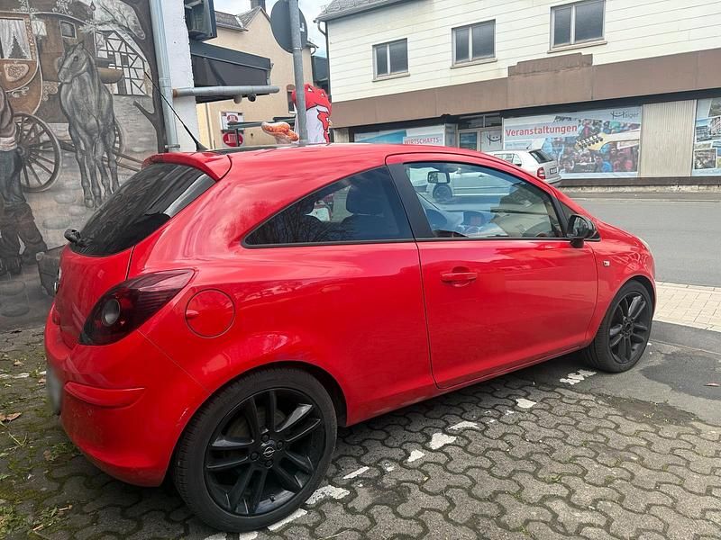 Używany Opel Corsa 101 KM (74 kW) 2013 Czerwony Hatchback