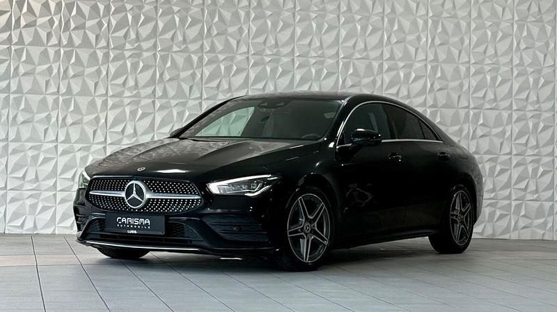 Schwarz Gebraucht 2021 Mercedes CLA220 AMG line Limousine | 29.400 € (Teuer) - Bild 1/4